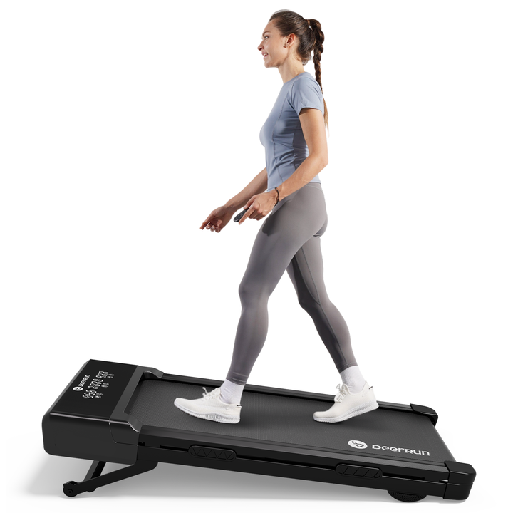 Foldable DeerRun treadmill stored upright against a wall