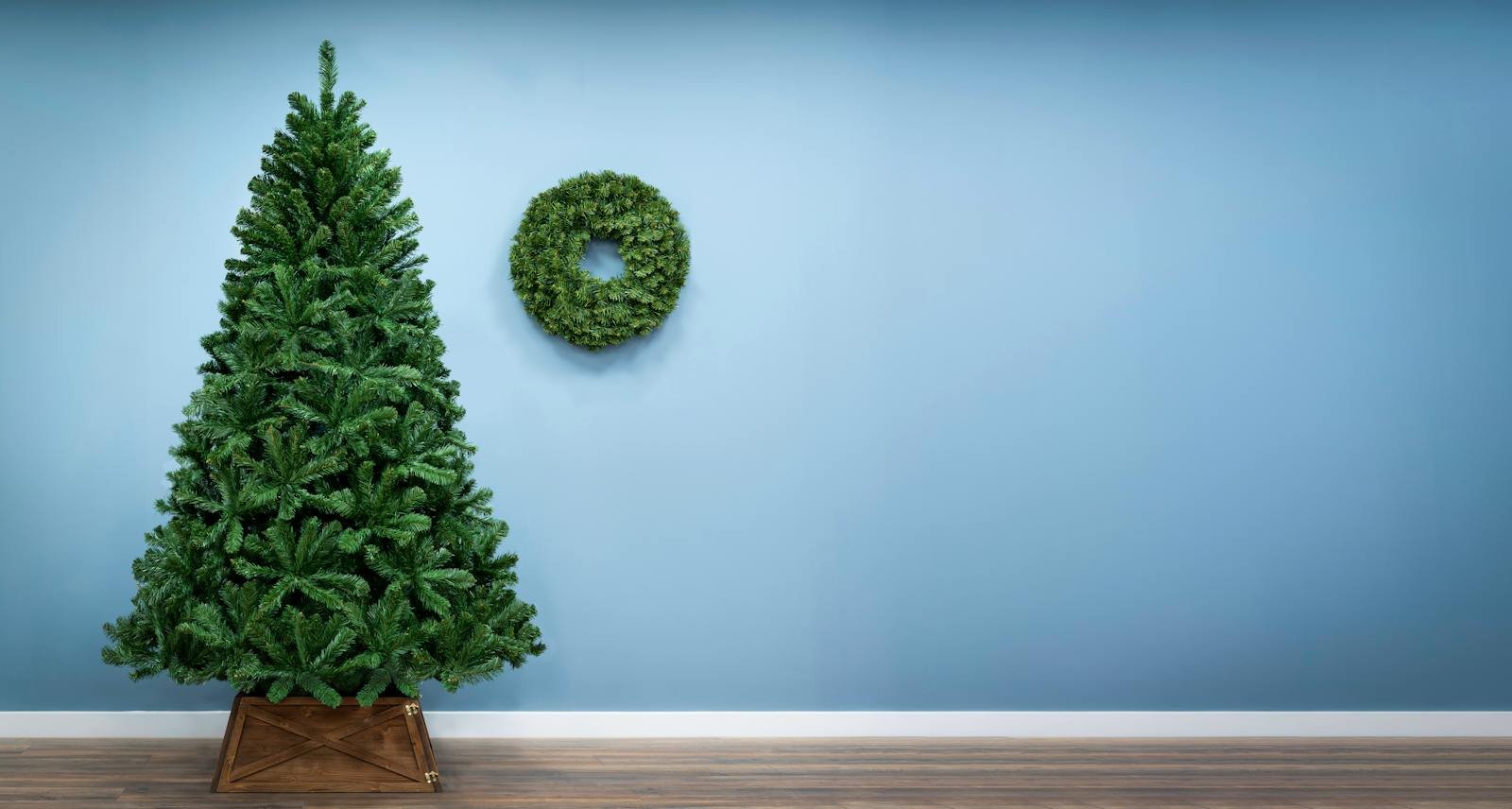 Artificial Christmas tree displayed in a warmly decorated festive interior